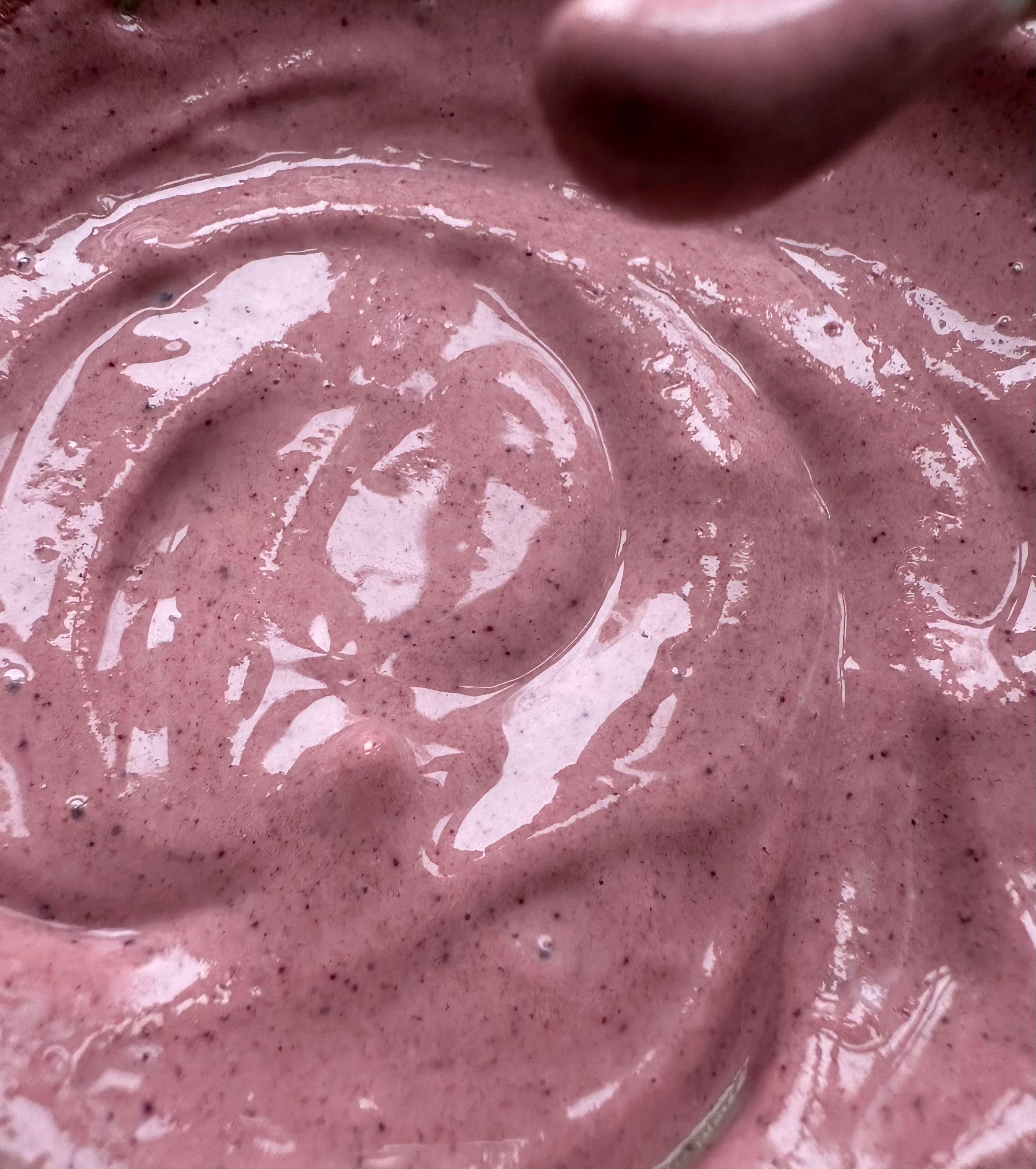 AKINA Clay Ceremony mask mixed with yoghurt, forming a smooth pink botanical clay texture